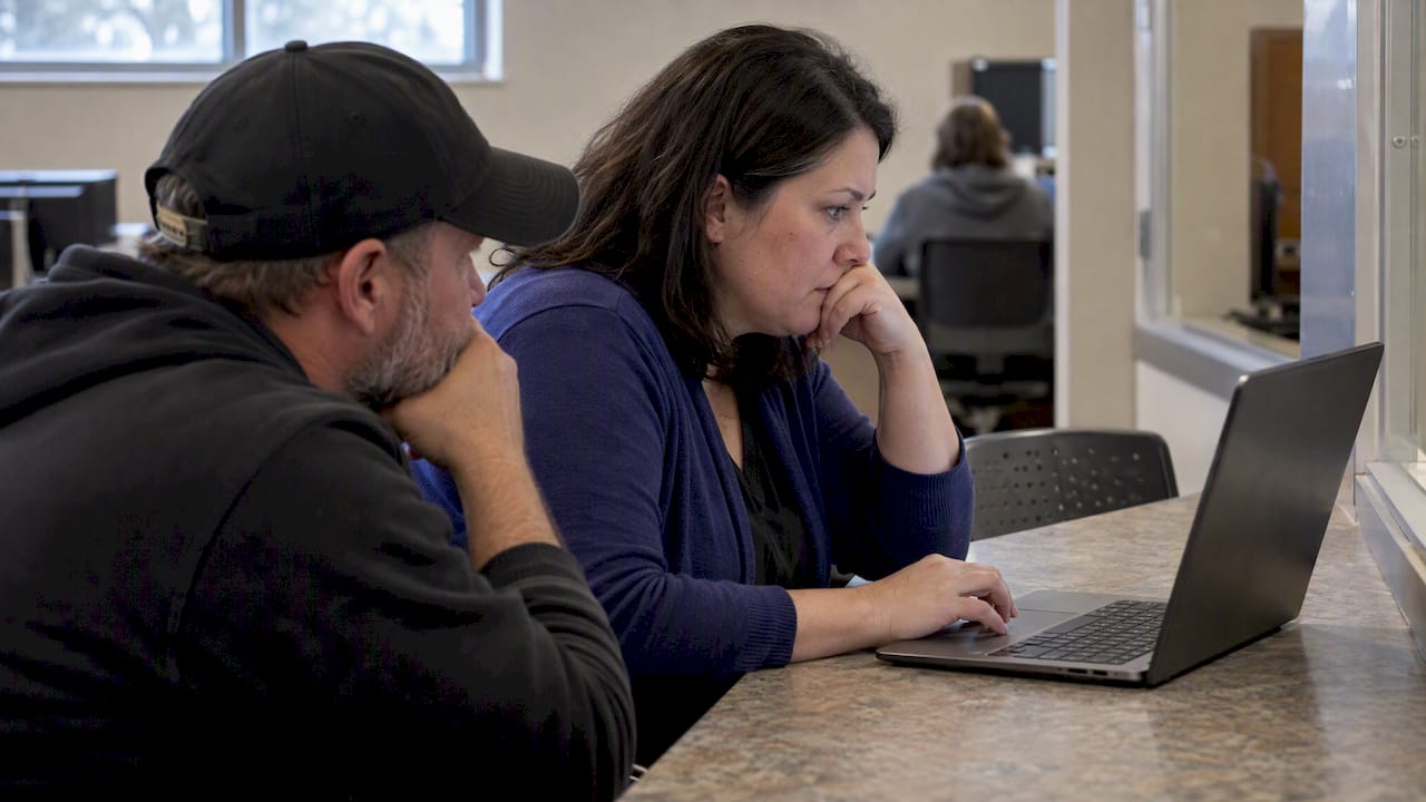 Family members reviewing an unidentified-person case