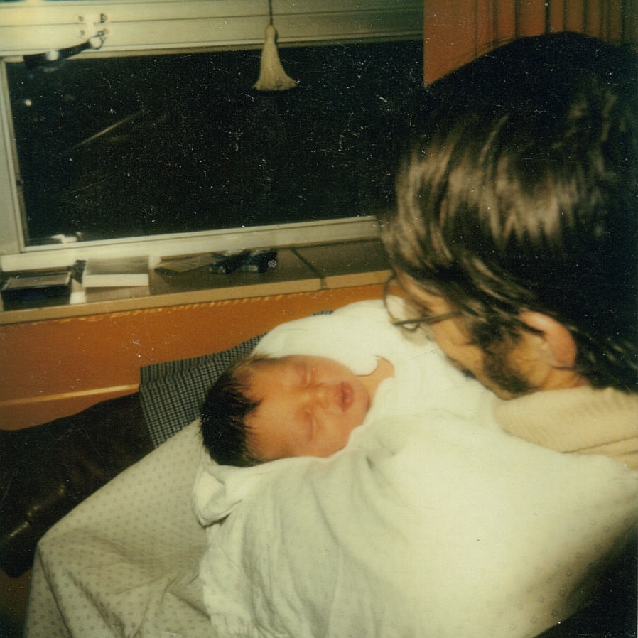 Philip while in the hospital with his  dad.
